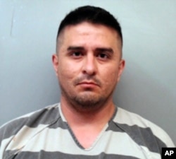 FILE - This file photo provided by the Webb County Sheriff's Office shows Juan David Ortiz, a U.S. Border Patrol supervisor who was jailed Sept. 16, 2018, on a $2.5 million bond in Texas, accused in the killing of at least four women.