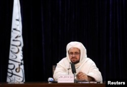 FILE - Taliban Higher Education Minister Abdul Baqi Haqqani speaks during a news conference in Kabul, Afghanistan, Jan. 12, 2022.