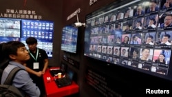 Facial recognition technology is shown at DeepGlint booth during the China Public Security Expo in Shenzhen, China, Oct. 30, 2017. 