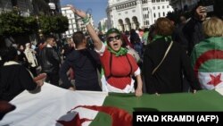 Manifestation anti-gouvernementale à Alger, en Algérie, le 21 février 2020. (Photo by RYAD KRAMDI / AFP)