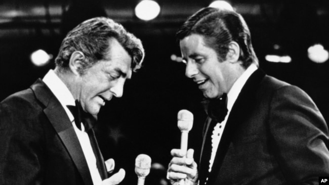 Dean Martin, left, and Jerry Lewis, whose comedy team broke up more than 20 years ago, appear together for the first time since the breakup on Lewis annual telethon for Muscular Dystrophy, Sept. 7, 1976, Las Vegas, Nevada.