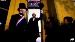 An actor portraying President Abraham Lincoln arrives at the train station in Gettysburg, Pennsylvania in 2013.