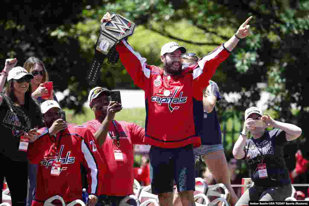 Washington Capitals right wing Tom Wilson (43) waves to the crowd during the Stanley Cup championship parade and celebration on Constitution Avenue.
