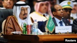 FILE - Saudi King Salman attends the opening meeting of the Arab Summit in Sharm el-Sheikh, in the South Sinai governorate, south of Cairo, March 2015. 