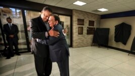 This Monday, April 3, 2017 file photo shows civil rights activist Jesse Jackson and former UN Ambassador Andrew Young embracing during a ceremony at the Memphis International Airport to unveil a historic marker commemorating the final flight of Dr. King.