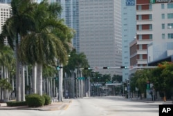 A street usually filled with cars is seen in deserted downtown Miami, Florida, Sept. 8, 2017. State authorities have asked 5.6 million people - more than one-quarter of Florida's population - to evacuate.