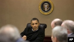 President Barack Obama is briefed on events in Egypt by his national security team meeting in the Situation Room of the White House, Washington, DC, January 29, 2011