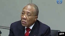 Former Liberian President Charles Taylor appearing in court at the Special Court for Sierra Leone in Leidschendam, January 22, 2013.