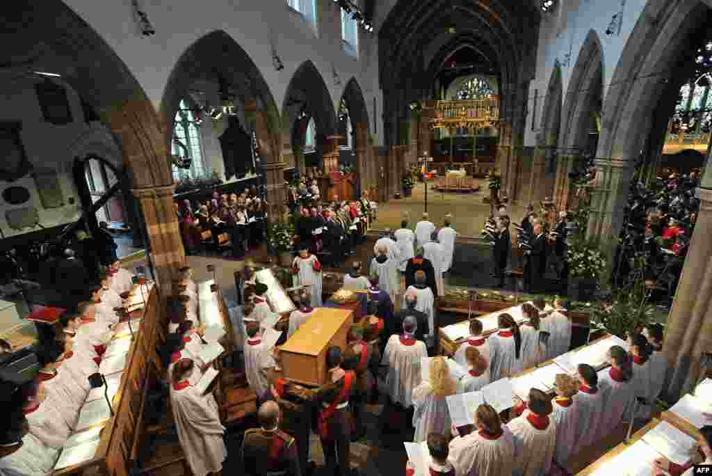 A handout picture released by Leicester Cathedral Quarter Partnership Board (LCQPB) shows the reinterment ceremony of England&rsquo;s Kind Richard III in Leicester Cathedral in central England. England&#39;s slain King Richard III, exhumed from an undignified grave under a car park, was finally buried with honor, 530 years after his death on the battlefield.