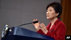 FILE - South Korean President Park Geun-hye spoke at a groundbreaking on Aug. 5, 2015, for the Gyongwon Line renovation project, saying "the door to opportunities that North Korea can participate in is always open." 