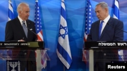 U.S. Vice President Joe Biden (L) and Israeli Prime Minister Benjamin Netanyahu deliver joint statements during their meeting in Jerusalem March 9, 2016. 