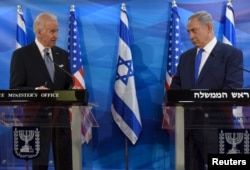 U.S. Vice President Joe Biden (L) and Israeli Prime Minister Benjamin Netanyahu deliver joint statements during their meeting in Jerusalem March 9, 2016.