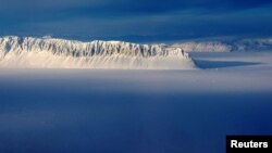 FILE PHOTO: Eureka Sound on Ellesmere Island in the Canadian Arctic is seen in a NASA Operation IceBridge survey picture taken March 25, 2014. Picture taken March 25, 2014. REUTERS/NASA/Michael Studinger/Handout/File Photo