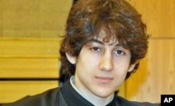 FILE - Dzhokhar Tsarnaev, shown in an undated photo, faces 30 counts in his federal death penalty trial.