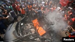 Quân đội Israel nói vụ oanh kích nhắm vào một chiếc xe hơi đã giết chết Mohammed al-Ghoul ở Thành phố Gaza, ngày 24 tháng 8, 2014.