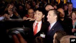 Republican presidential candidate Ted Cruz has his photo taken with a supporter after speaking at the California Republican Party 2016 Convention in Burlingame, Calif., April 30, 2016.
