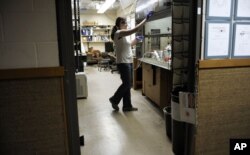 A September 19, 2011 photo shows a second-year chemistry doctoral student working at Kline Chemistry Laboratory at Yale University in New Haven, Connecticut.