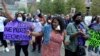 Haitiano-amerikanët gjatë një proteste në Boston (24 shtator 2021)