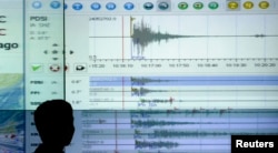 FILE - A geologist looks at a screen showing the seismograph reading of a powerful earthquake that rocked Sumatra island at the office of meteorological agency in Jakarta September 30, 2009. (REUTERS/Supri )