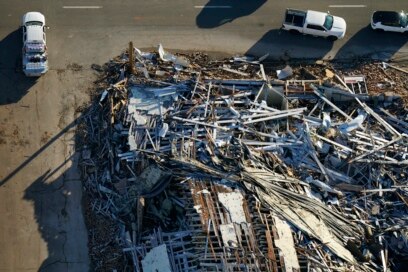 Six dead, no hope of more survivors after tornadoes destroy