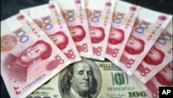 Кина ги повика САД да не го политизираат спорот околу јенот