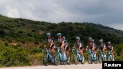 Radioshack-Leopard team riders cycle during a training session for the centenary Tour de France cycling race on the French Mediterranean island of Corsica, Porto-Vecchio, France, June 28, 2013.
