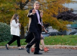 Sen. Joe Manchin, D-W.Va., walks on the White House campus, Nov. 18, 2021.