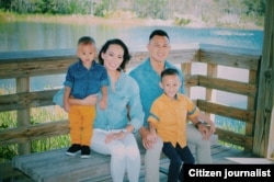 Andre Soukhamthath with his wife, Jamie, and their two children.