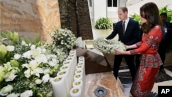 The Duke and Duchess of Cambridge, Prince William, and his wife, Kate, lay a wreath on the martyrs memorial at the Taj Mahal Palace Hotel in Mumbai, India, April 10, 2016. 