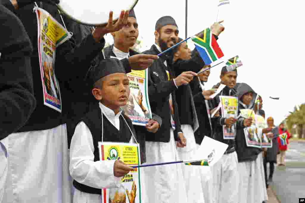 Un enfant chantant&nbsp; à Cape Town à l&#39;occasion de l&#39;anniversaire de Nelson Mandela. 