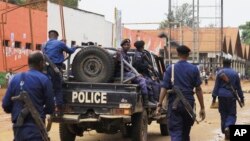 La police congolaise intervient pour réprimer les manifestations dans la ville de Beni, dans l'est du Congo, le 28 décembre 2018.