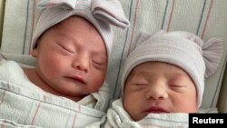 Twins Aylin Trujillo, born at 00:00 on January 1, 2022, and Alfredo Trujillo, born at 23:45 on December 31, 2021, are pictured in Salinas, California, U.S., January 1, 2022 in this image from social media. (Natividad Medical Center/via REUTERS)