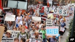 Citizens march against fracking at the "Shale Gas Outrage Rally" in Philadelphia.