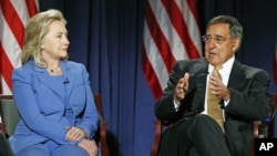 US Secretary of State Hillary Rodham Clinton and Secretary of Defense Leon Panetta (R) take part in a televised conversation at the National Defense University in Washington, DC, August 16, 2011
