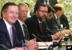 Brazil's Foreign Minister Ernesto Araujo, center, attends a meeting of the Lima Group concerning Venezuela in Lima, Peru, Jan. 4, 2019.