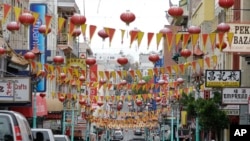 This Tuesday, Dec. 21, 2010 photo shows a view of Grant Street in Chinatown in San Francisco. Although many of the original inhabitants have moved out to other areas of the city as well as suburbs, this is still a starting point for many new residents. Many new residents work in the area's large technology sector.