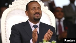 FILE - Ethiopia’s newly elected prime minister, Abiy Ahmed, attends a rally during his visit to Ambo in the Oromiya region of Ethiopia, April 11, 2018. In his first U.S. visit, Abiy will focus on connecting with diaspora communities.