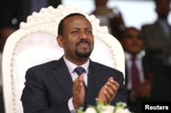 FILE - Ethiopian Prime Minister Abiy Ahmed attends a rally during his visit to Ambo in the Oromia region of Ethiopia, April 11, 2018. Tensions in Ethiopia’s Somali region are considered among his biggest tests since assuming office earlier this year.