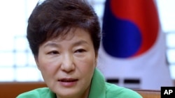 FILE - South Korean President Park Geun-hye speaks during a regular meeting at the presidential house in Seoul, South Korea.