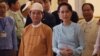 နိုင်ငံတော် အတိုင်ပင်ခံပုဂ္ဂိုလ် ဒေါ်အောင်ဆန်းစုကြည် (ညာ) နဲ့ သမ္မတ ဦးဝင်းမြင့် (ဝဲ)။ 