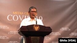 Jubir Penanganan Virus Korona Dr Achmad Yurianto dalam konferensi pers di Kantor Presiden, Jakarta, Jumat, 6 Maret 2020. (Foto: VOA/Ghita)