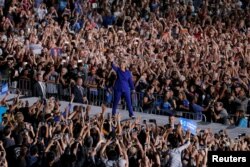 U.S. Democratic presidential nominee Hillary Clinton takes the stage at a campaign rally at Arizona State University in Tempe, Arizona, Nov. 2, 2016.