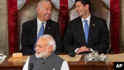 Vice President Joe Biden and House Speaker Paul Ryan laugh as Indian Prime Minister Narendra Modi addresses a joint meeting of Congress on Capitol Hill in Washington, June 8, 2016. 