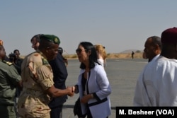 U.S. Deputy Ambassador to the United Nations Michele Sison shaking the hand of a military commander in Maroua, northern Cameroon, where the Council met IDPs and refugees of the Boko Haram crisis.