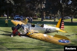 An airplane — reportedly flown by actor Harrison Ford — sits on the ground after crash-landing at Penmar Golf Course in Venice, California, March 5, 2015.