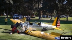 An airplane — reportedly flown by actor Harrison Ford — sits on the ground after crash-landing at Penmar Golf Course in Venice, California, March 5, 2015.