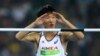 Woo Sang-hyuk of South Korea reacts in the men's high jump qualifying round during the Olympic Games in Rio de Janeiro, Brazil, Aug. 14, 2016.