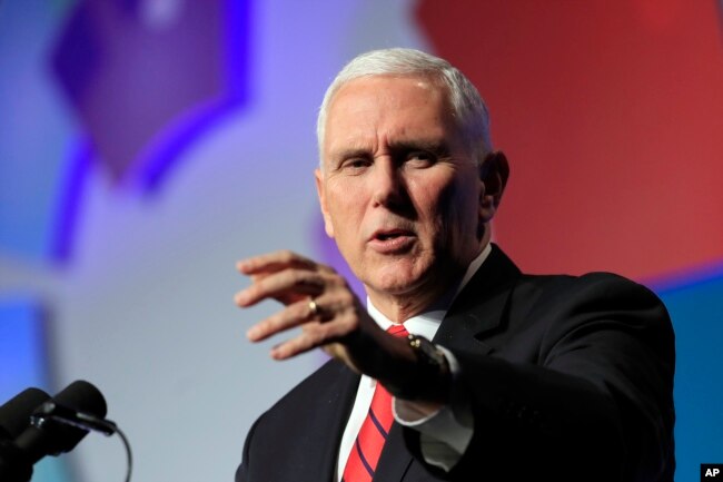 FILE - Vice President Mike Pence speaks at the Hidden Heroes 3rd Annual National Convening at the Capital Hilton in Washington, Nov. 26, 2018.