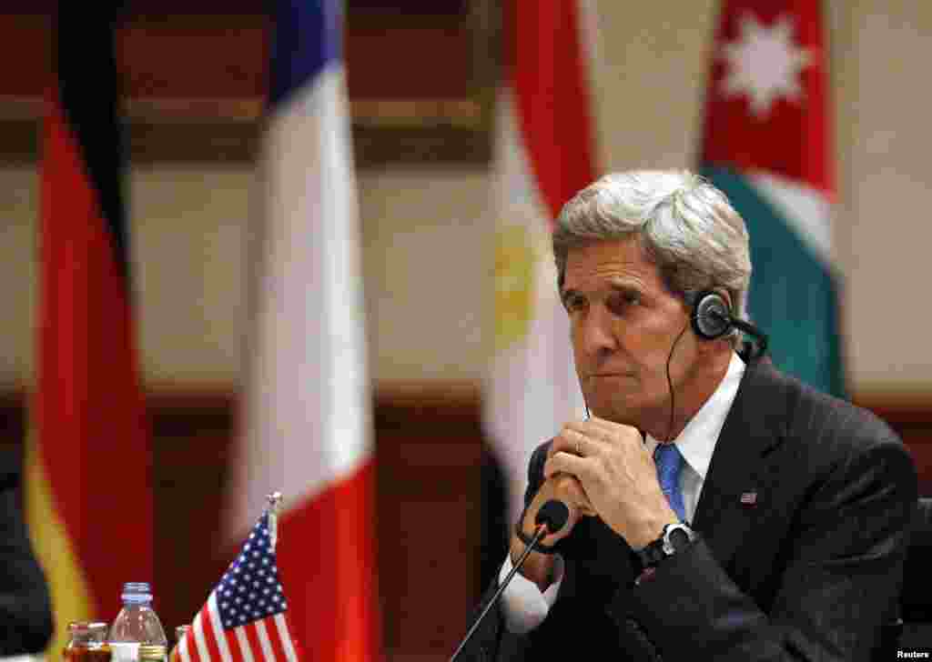 U.S. Secretary of State John Kerry listens to remarks at a meeting on Syria in Amman, Jordan, May 22, 2013.