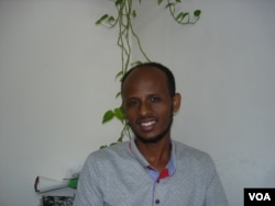 Solomon Gebreyohanes, 29, of the village of Tselimkala in southern Eritrea wanted to go to Europe, was detained on the Libyan coast, and changed course to Israel where he is struggling to make ends meet. (J. Brilliant/VOA)